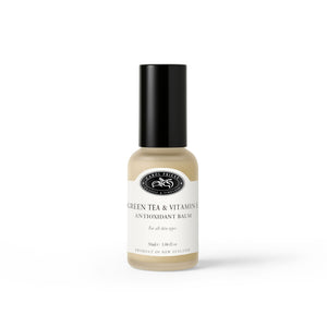 Bottle of carol priest green tea & vitamin e antioxidant balm on a white background