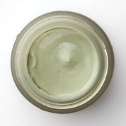 Green Clay Mask with Herbal Oils Texture in Pot